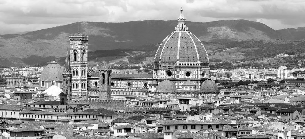 Black and white image of Florence Cathedral Duomo with the Tuscan landscape.