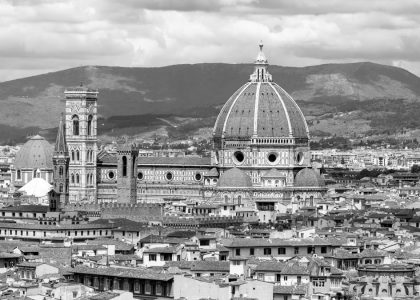 Black and white image of Florence Cathedral Duomo with the Tuscan landscape.